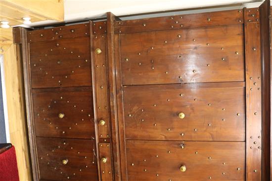 A large Swiss or Austrian chestnut cupboard W.212cm approx.